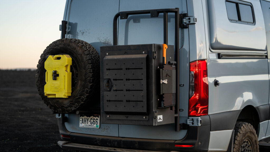 Rear view of a Sprinter van featuring Aluminess products.