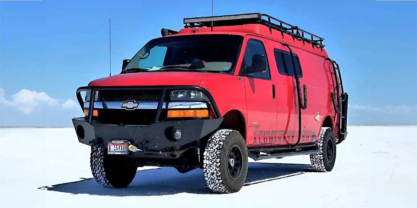 Chevy van in the snow.