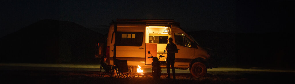 Aluminess van with adventure gear.